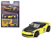 MINI GT 1:64 Nissan Z LB-Nation Works #23 in Ikazuchi Yellow with black hood and roof.