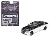 MINI GT 1:64 BMW i7 xDrive60 in Alpine White and Black Sapphire, item MGT00959.