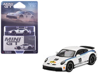 MINI GT 1:64 Porsche 911 Dakar #19 Rally 1974 Tribute in white with blue stripes.