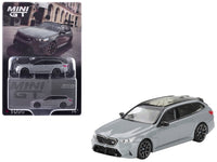 MINI GT 1:64 BMW M5 Touring in Brooklyn Gray metallic.