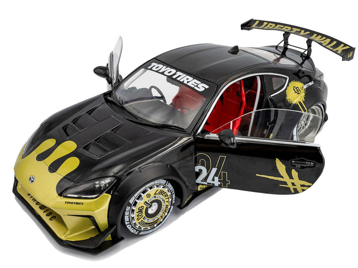 2024 Toyota GR86 Liberty Walk Body Kit RHD (Right Hand Drive) #24 Black with Gold Graphics 1/18 Diecast Model Car by Solido image 2