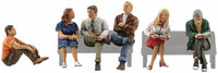 Woodland Scenics A2759 O scale People Sitting, painted miniature set. Benches shown for placement only; not included.