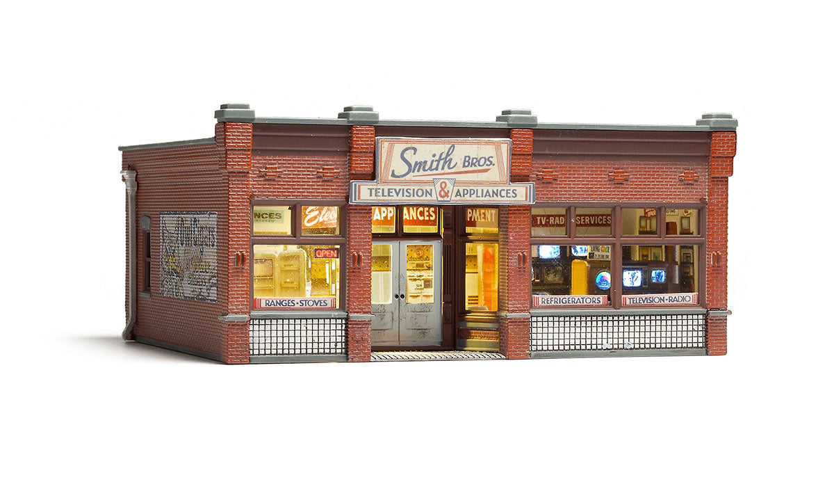 Woodland Scenics BR5069 Smith Brothers TV and Appliance HO scale illuminated storefront