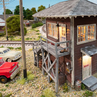 Woodland Scenics BR5074 HO Interlocking Tower, illuminated upper balcony and lower entrance detail