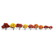 Nine Woodland Scenics TR3540 Harvest Blaze trees displayed separately, showing their varied sizes and fall colors.