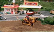 Woodland Scenics AS5562 Dewie's Dozer in an HO scale construction scene