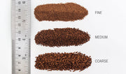 Woodland Scenics brown ballast grade comparison; B79 medium grade is the middle sample labeled MEDIUM. Other grades are shown only for comparison.