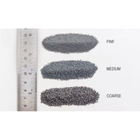Woodland Scenics gray ballast grade comparison; B82 medium grade is the middle sample labeled MEDIUM. Fine and coarse grades are shown only for comparison.