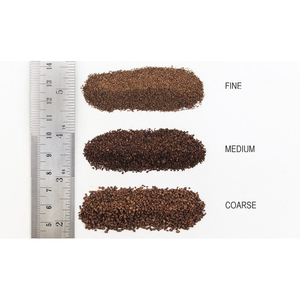 Woodland Scenics dark brown ballast grade comparison; B85 coarse grade is the bottom sample labeled COARSE. Other grades are shown only for comparison.
