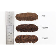 Woodland Scenics dark brown ballast grade comparison; B85 coarse grade is the bottom sample labeled COARSE. Other grades are shown only for comparison.