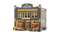 Woodland Scenics BR4921 N scale Harrison's Hardware built-up building, front three-quarter view.