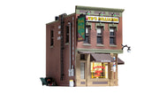 Woodland Scenics BR5024 Corner Emporium HO scale built-up building, barber shop side view.