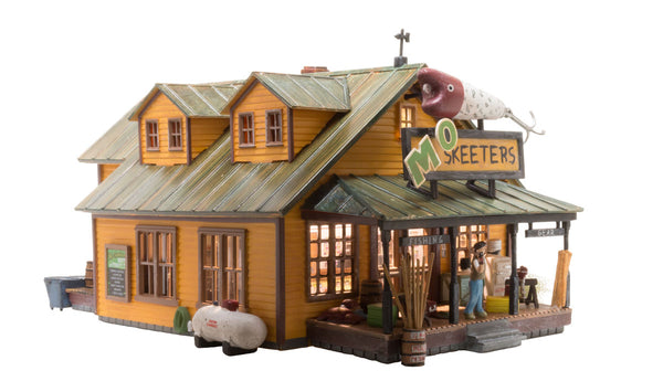 Woodland Scenics BR5047 Mo Skeeters Bait & Tackle HO scale Built-&-Ready model, front view with porch and fishing-lure sign.