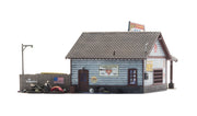 Woodland Scenics BR5048 Ethyl's Gas & Service HO scale Built-&-Ready model, rear view with service door and exterior details.