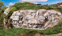 Woodland Scenics C1137 Faceted Ready Rocks, installed landscape example; surrounding scenery is separate.