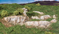 Woodland Scenics C1139 Outcropping Ready Rocks, installed landscape example; surrounding scenery is separate.