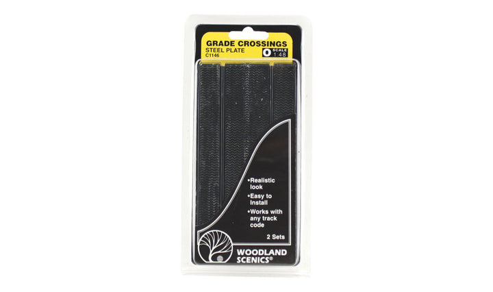 Woodland Scenics C1146 O scale steel plate grade crossing, manufacturer package containing two crossing sets.