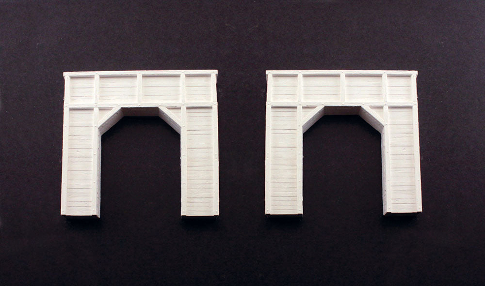 Woodland Scenics C1154 N scale timber single-track tunnel portals, pair of unpainted portal castings.