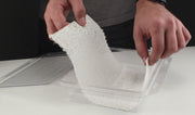 Woodland Scenics C1193 Plaster Cloth Sheets close-up as a sheet is lifted from its storage tray