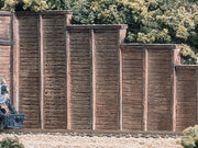 Woodland Scenics C1260 HO scale timber retaining walls, painted and arranged layout example; track, figure and scenery are not included.