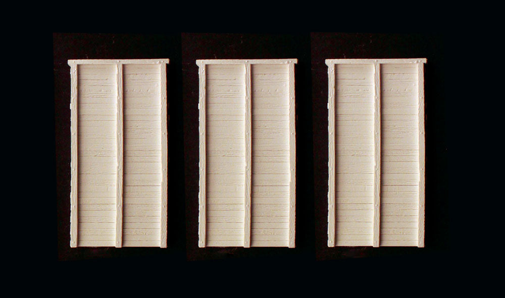 Woodland Scenics C1260 HO scale timber retaining walls, three unpainted wall sections.