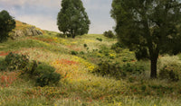 Woodland Scenics T48 flower material applied to a model landscape; trees, grass and other scenery shown as an application example.