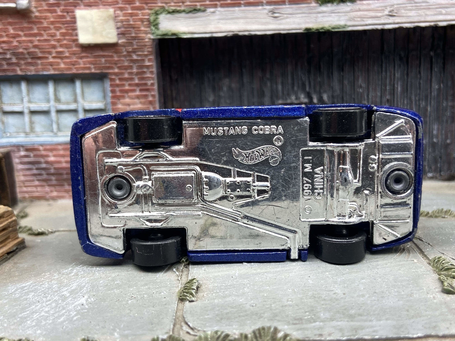 (1 of 2) 1997 Hot Wheels 1:64 scale Blue Ford Mustang Cobra, flame graphics, loose. Definitely has wear, please see pics. BARGAIN BIN!