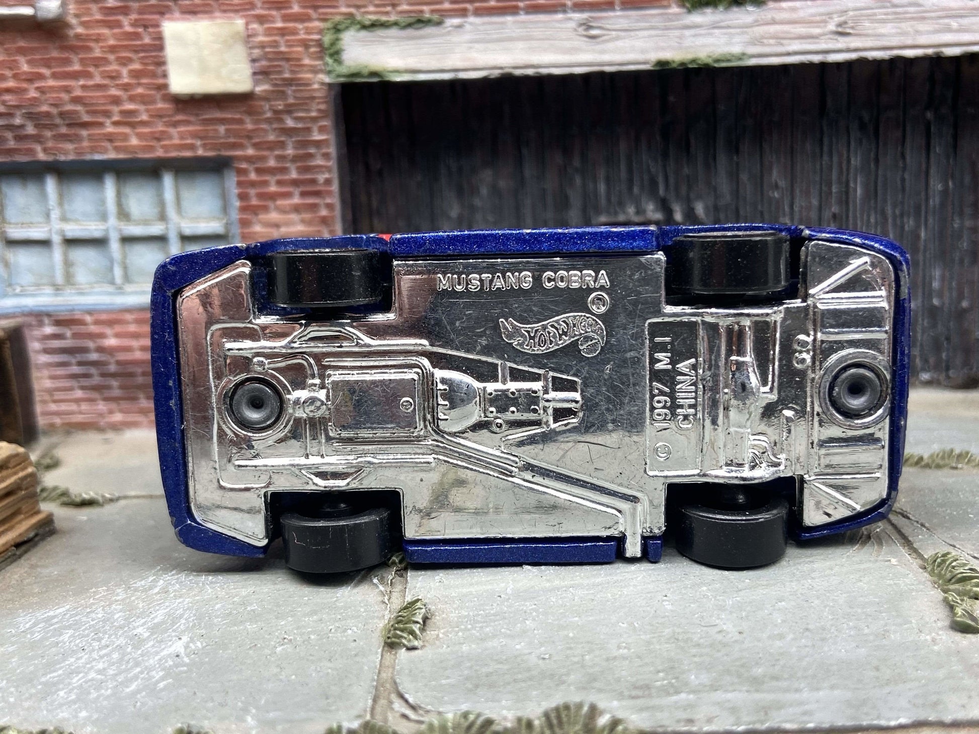 (1 of 2) 1997 Hot Wheels 1:64 scale Blue Ford Mustang Cobra, flame graphics, loose. Definitely has wear, please see pics. BARGAIN BIN!