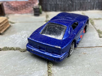 Loose Hot Wheels Ford Mustang Cobra, blue flame graphics, view 4