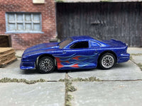 Loose Hot Wheels Ford Mustang Cobra, blue flame graphics, view 3