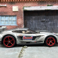 Copy of Loose Hot Wheels Chevy Corvette C7-R Race Car Dressed in Silver and Black Summit Racing