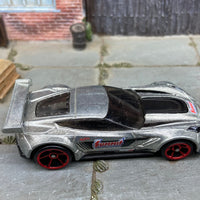 Copy of Loose Hot Wheels Chevy Corvette C7-R Race Car Dressed in Silver and Black Summit Racing