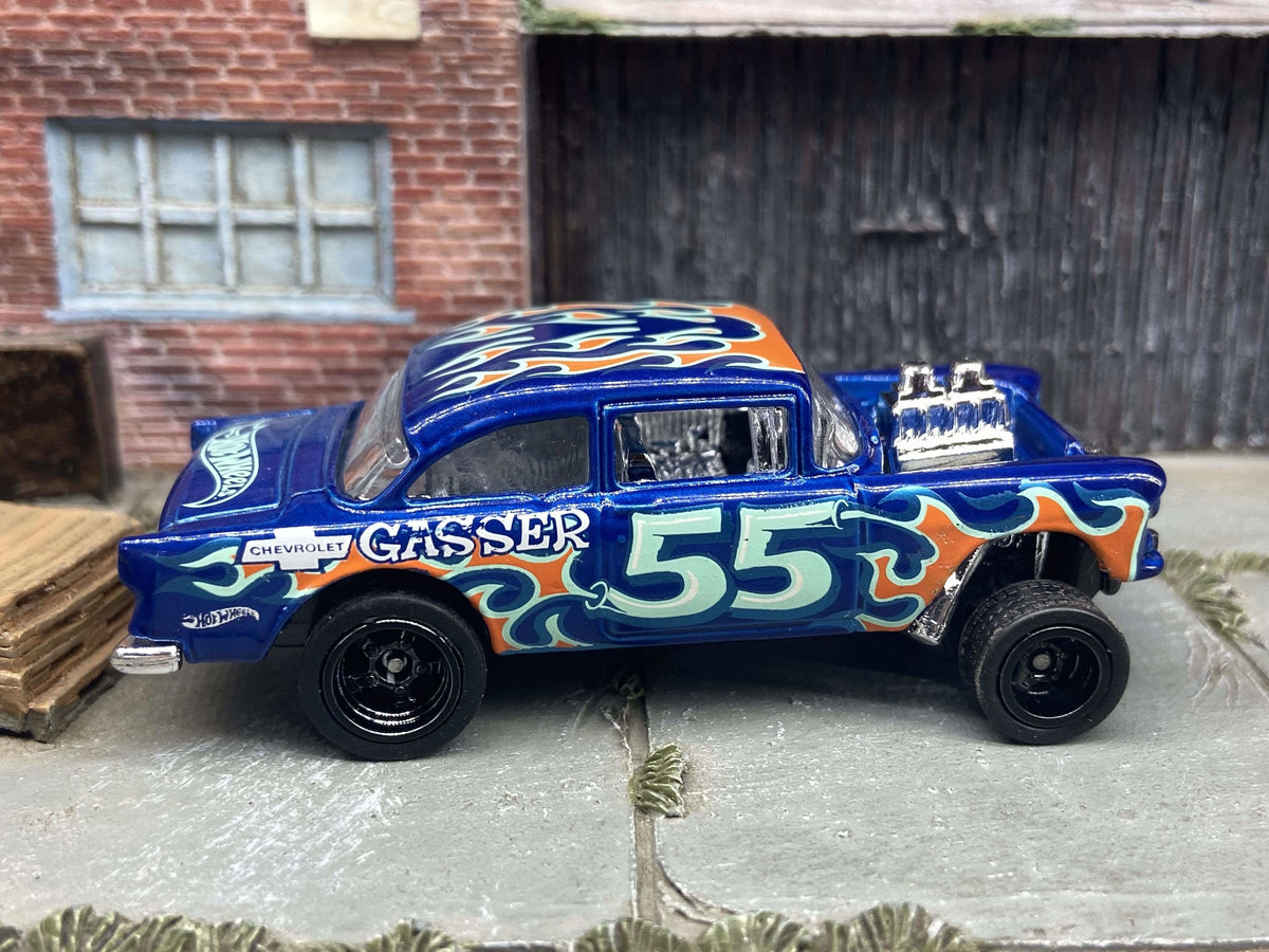 Front three-quarter view of blue 1955 Chevy Gasser custom Hot Wheels with black wheels
