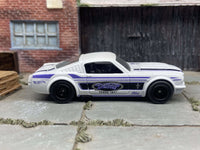 1965 Ford Mustang Fastback custom, Detroit white and blue, black wheels, view 3