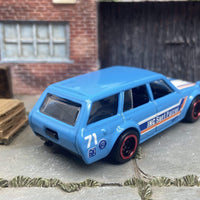 Custom Hot Wheels 1971 Datsun 510 Wagon In Light Blue and White With Black and Red 5 Spoke Wheels With Rubber Tires