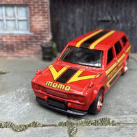 Custom Hot Wheels 1971 Datsun 510 Wagon In MOMO Red Yellow Black With Chrome and Red 4 Spoke Race Wheels With Rubber Tires