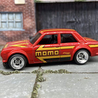 Custom Hot Wheels 1971 Datsun Bluebird 510 In Red Momo With 4 Spoke Mag Wheels With Rubber Tires