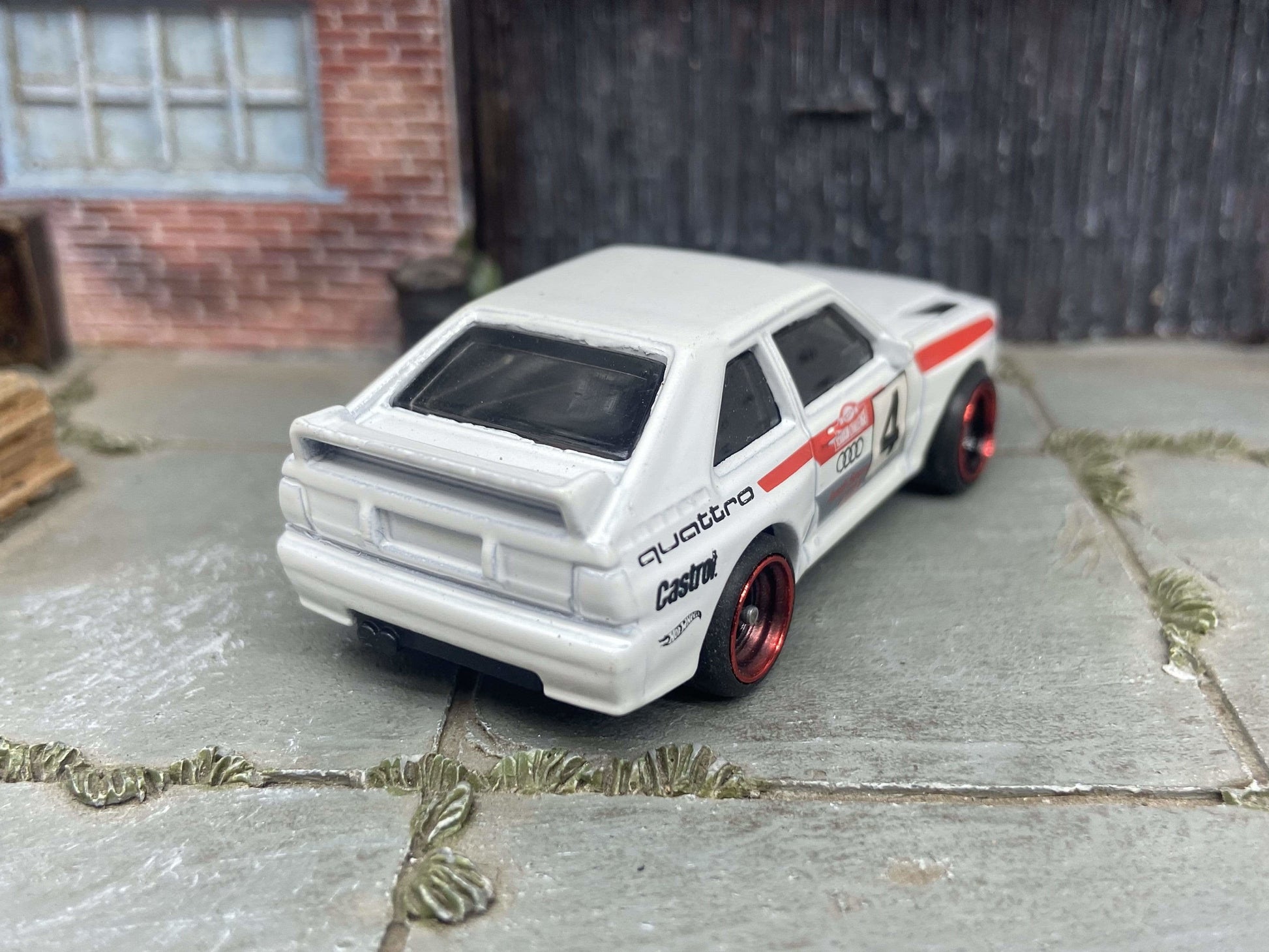 Custom Hot Wheels 1984 Audi Sport Quatro In White Red and Green Livery With Black and Red 4 Spoke Race Wheels With Rubber Tires
