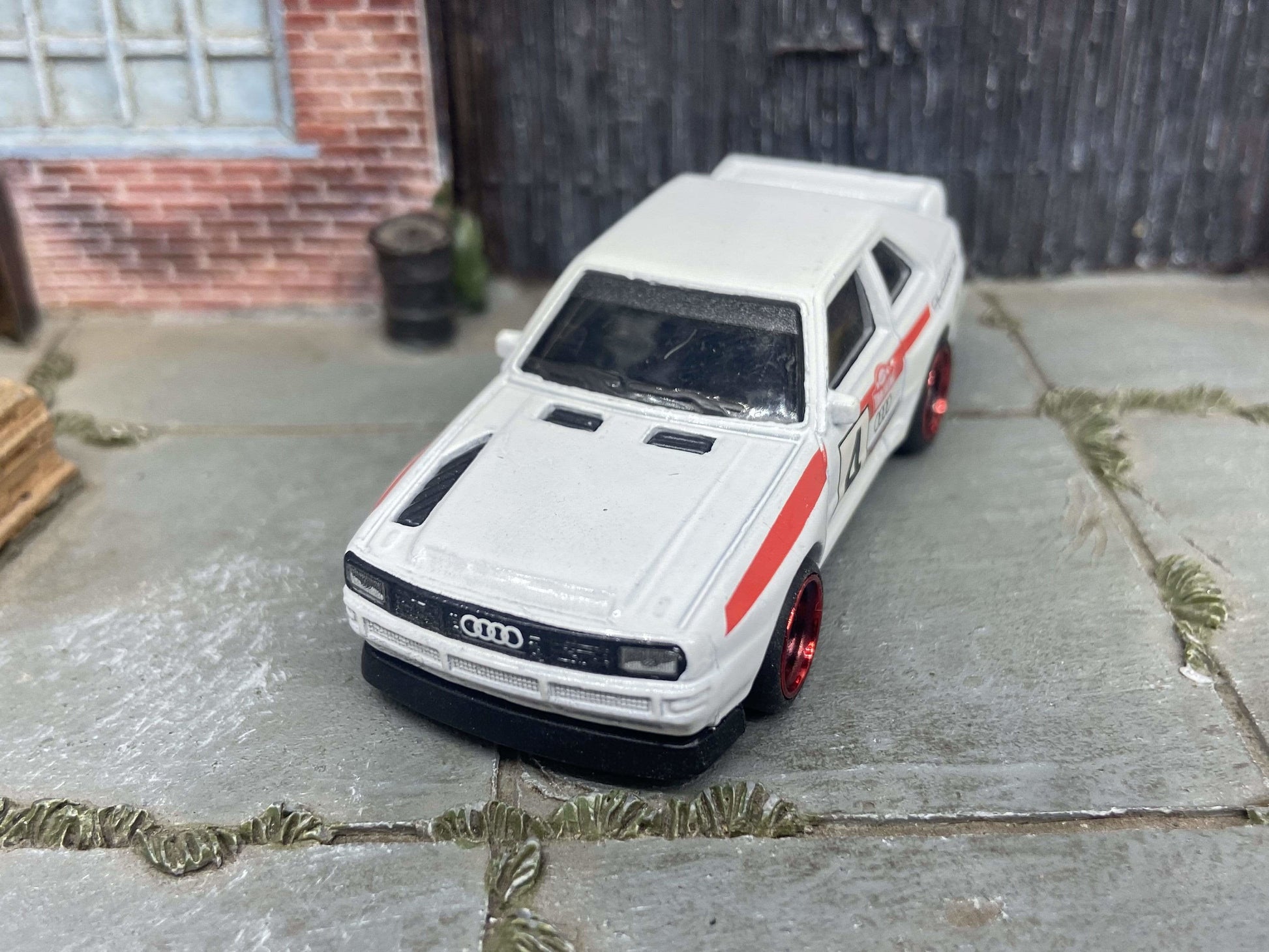 Custom Hot Wheels 1984 Audi Sport Quatro In White Red and Green Livery With Black and Red 4 Spoke Race Wheels With Rubber Tires