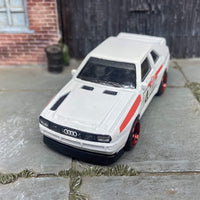 Custom Hot Wheels 1984 Audi Sport Quatro In White Red and Green Livery With Black and Red 4 Spoke Race Wheels With Rubber Tires