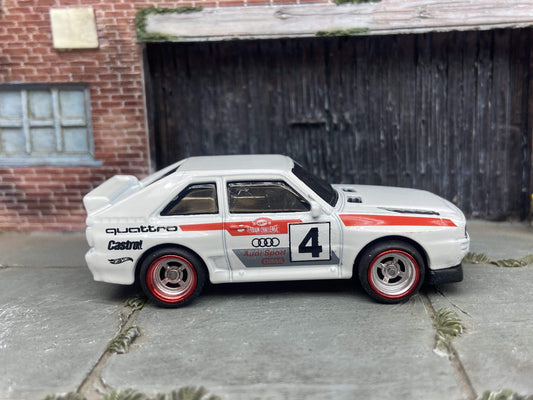 Custom Hot Wheels 1984 Audi Sport Quatro In White Red and Green Livery With Chrome and Red 4 Spoke Race Wheels With Rubber Tires