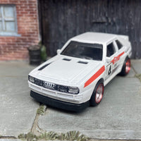 Custom Hot Wheels 1984 Audi Sport Quatro In White Red and Green Livery With Chrome and Red 4 Spoke Race Wheels With Rubber Tires