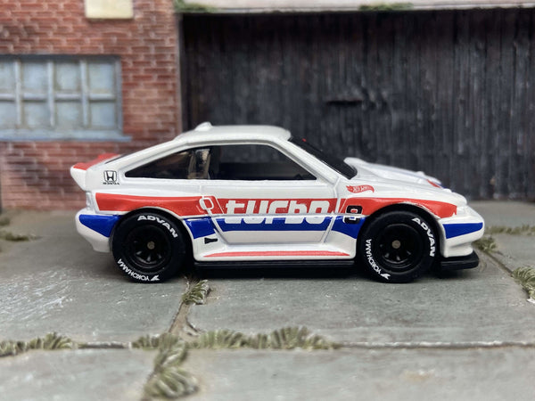 White 1985 Honda CRX custom Hot Wheels with black wheels, view 1