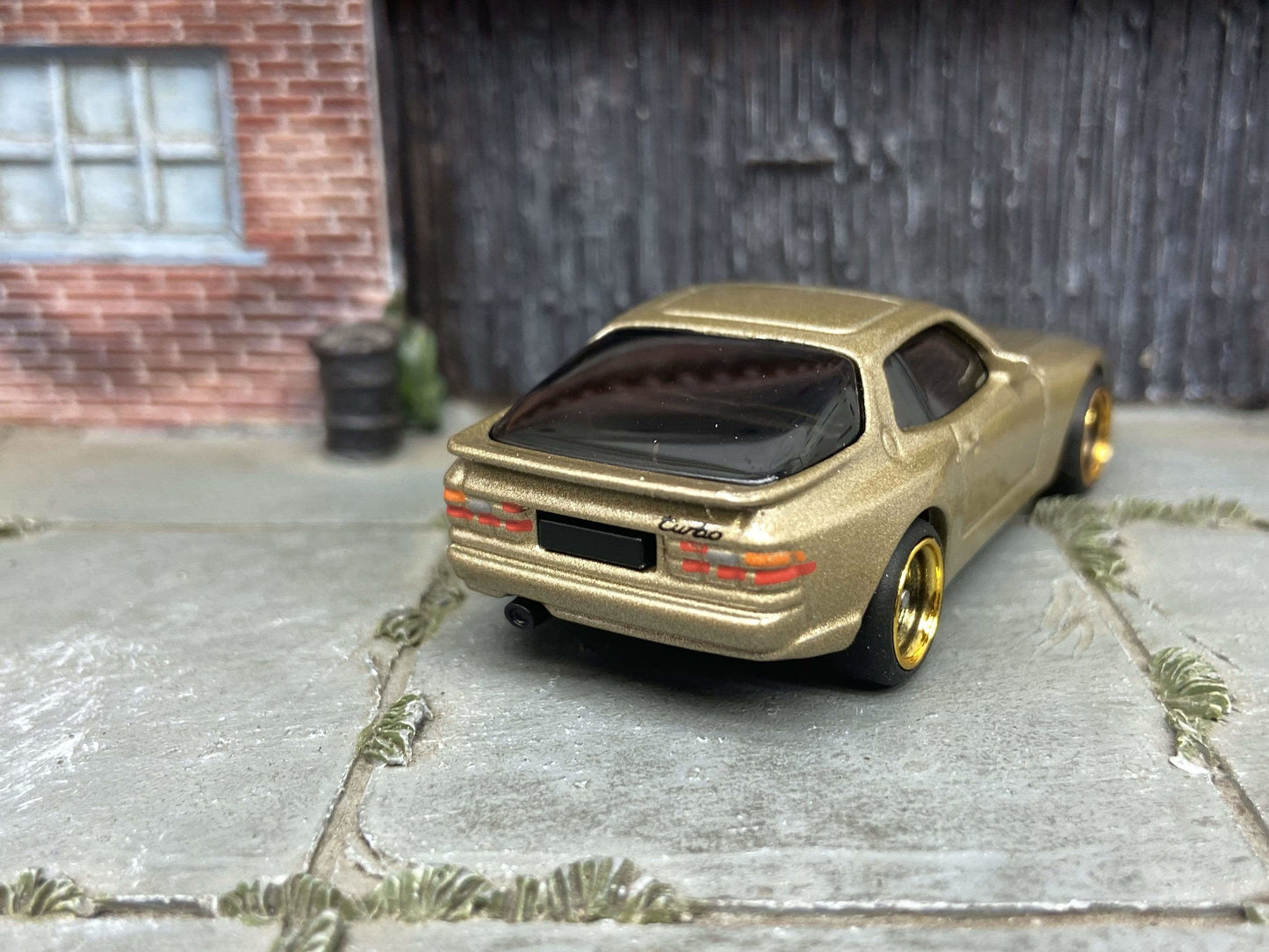 Custom Hot Wheels 1989 Porsche 944 Turbo In Gold With Black and Gold 4 Spoke Wheels With Rubber Tires