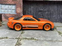 Orange 1995 Mazda RX-7 custom Hot Wheels with orange wheels, view 3