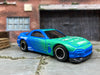 Custom Hot Wheels 1995 Mazda RX7 In Blue and Green  Falken Tires With Black and Chrome Steel Wheels With Firestone Tires