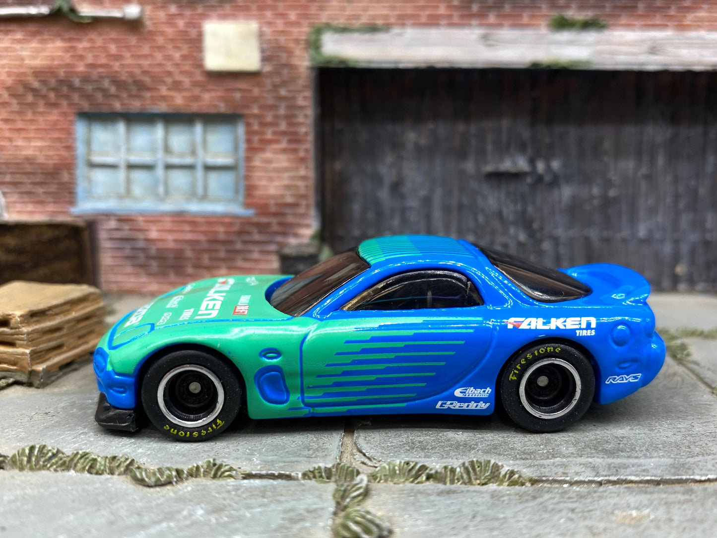Custom Hot Wheels 1995 Mazda RX7 In Blue and Green  Falken Tires With Black and Chrome Steel Wheels With Firestone Tires