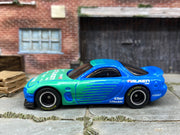 Custom Hot Wheels 1995 Mazda RX7 In Blue and Green  Falken Tires With Black and Chrome Steel Wheels With Firestone Tires