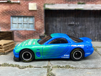 Custom Hot Wheels 1995 Mazda RX7 In Blue and Green  Falken Tires With Black and Chrome Steel Wheels With Firestone Tires