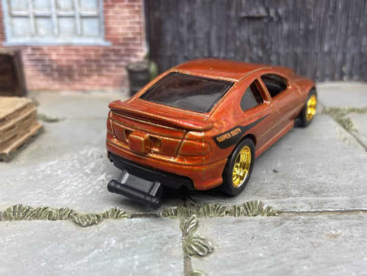 Custom Hot Wheels - 2006 Pontiac GTO - Burnt Orange - Gold 5 Spoke Racing Wheels - Rubber Tires